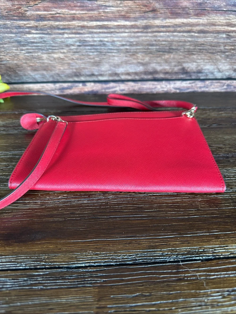 Kate Spade Laurel Way crossbody/clutch/wristlet bag in a vibrant rooster red